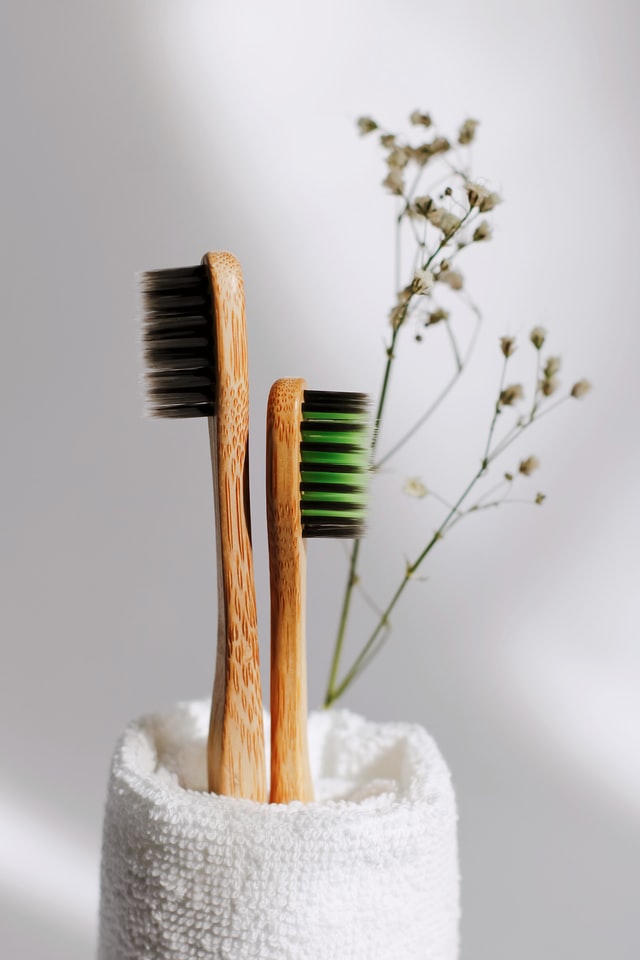 wooden 								toothbrush